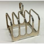 An Edwardian silver five bar toast rack. Birmingha