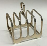 An Edwardian silver five bar toast rack. Birmingha
