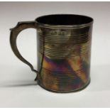 A George III reeded silver mug. London 1826. by Th