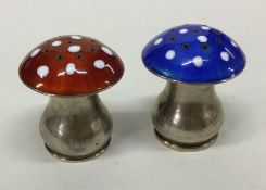 A pair of Norwegian silver and enamel condiments i