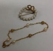 A gold and pearl bracelet together with matching b