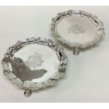 An important pair of rare George II silver salvers