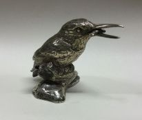 A cast silver figure of a kingfisher. Approx. 796