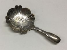 A silver caddy spoon with hollow handle to engrave