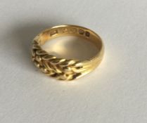 A good 18 carat gold keeper ring. Approx. 5 grams.