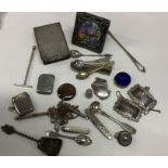 A bag of assorted silver and plated items. Est. £2