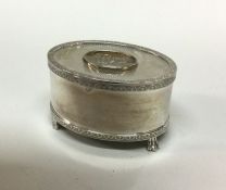 A Commemorative silver musical box with chased boa