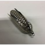 A heavy silver model of a corn on the cob. Approx.