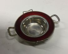 A Norwegian silver and red enamel dish. Marked to
