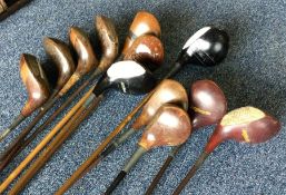 A selection of twelve various steel handled golf d