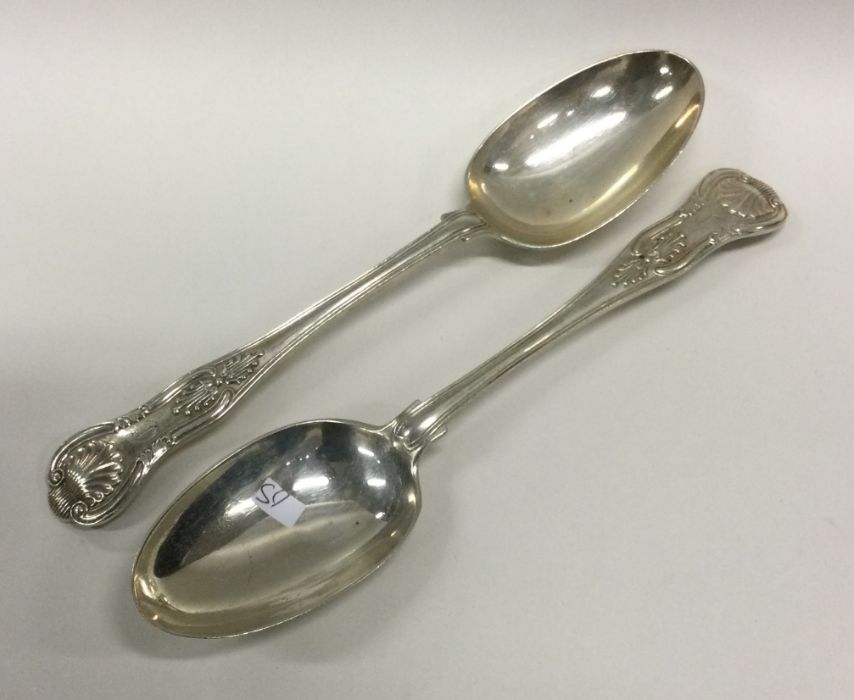 A pair of heavy Kings' pattern silver tablespoons.