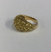 An 18 carat gold keeper ring. Approx. 8 grams. Est