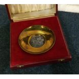 An unusual silver mounted and brass armada dish co