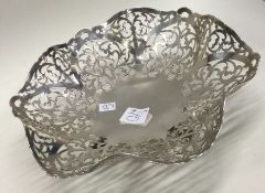 An attractive pierced sweet dish with shaped edge.