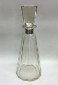 A large Danish silver mounted glass decanter. Est.