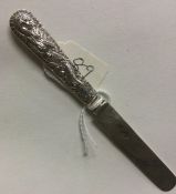 A Chinese silver knife of typical form. Est. £20 -