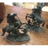 A pair of spelter Marly horses. Est. £30 - £50.