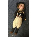 A good Dutch porcelain headed doll in outfit. Est. £50 -