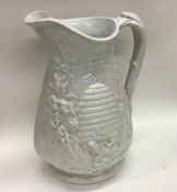 An old Ironstone jug. Est. £30 - £40.