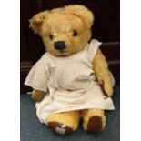 An old Chad Valley teddy bear. Est. £20 - £30.