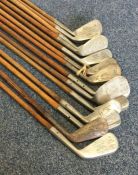 A wooden handled HICKORY golf club by Robert D Ran