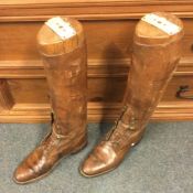 A pair of leather boots with trees. Est. £30 - 350