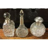 Three silver mounted scent bottles. Est. £30 - £50