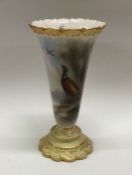 An attractive Royal Worcester vase depicting pheas