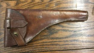 An unusual leather holster for an early automatic