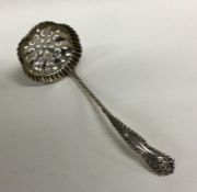 A Victorian silver sifter spoon. Birmingham 1898.