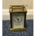 A brass carriage clock by 'Mappin & Webb'. Est. £2