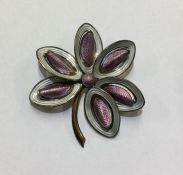 A stylish silver and enamelled Norwegian brooch. A