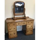 A good Victorian seven drawer desk together with a