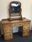 A good Victorian seven drawer desk together with a