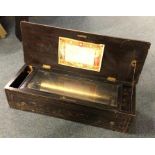 An old Victorian rosewood music box. Est. £50 - £8