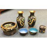 A good garniture of cloisonné vases. Est. £50 - £8