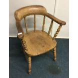 A pine bow back chair. Est. £30 - £40.