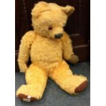 An old Chad Valley teddy bear. Est. £20 - £30.