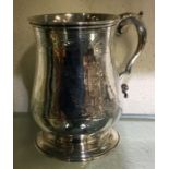 A good Victorian silver mug engraved with swags. L