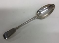 A Georgian silver fiddle pattern tablespoon. Londo