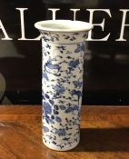 A Chinese blue and white vase. Signed to base. Est