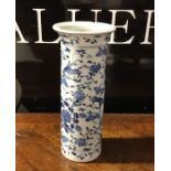 A Chinese blue and white vase. Signed to base. Est