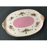 A Victorian oval porcelain tray. Est. £20 - £30.