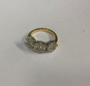 A good diamond triple cluster ring with shaped pri