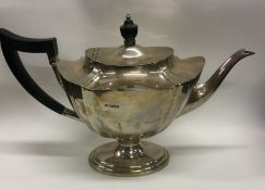 A heavy large silver pedestal teapot. Sheffield. B