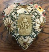 A World War I North Devon beadwork sweetheart cush