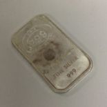 A 999 fine silver ingot. Approx. 31 grams. Est. £30 - £50.