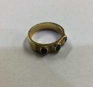 A good 18 carat gold emerald and diamond ring. App