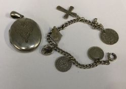 A silver charm bracelet together with an engraved