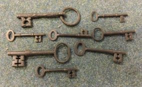 A large collection of cast iron keys. Est. £20 - £